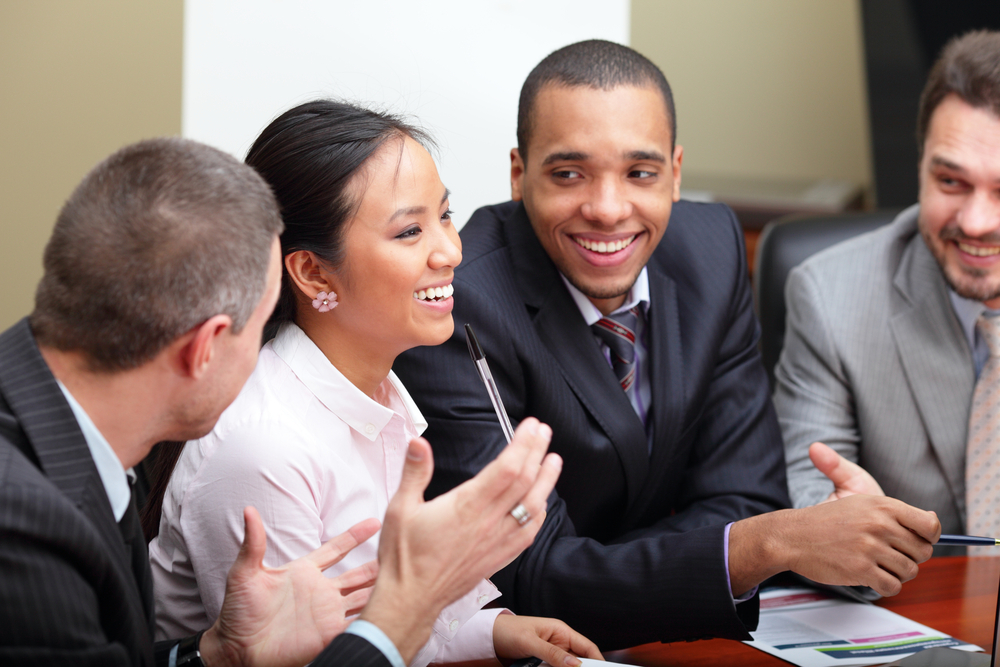 Diverse business people collaborate in a meeting
